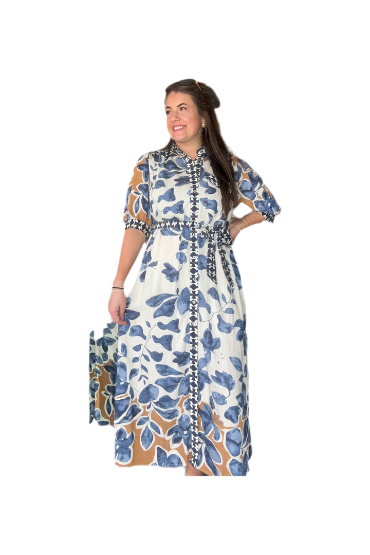 Woman wearing a floral dress with a white background