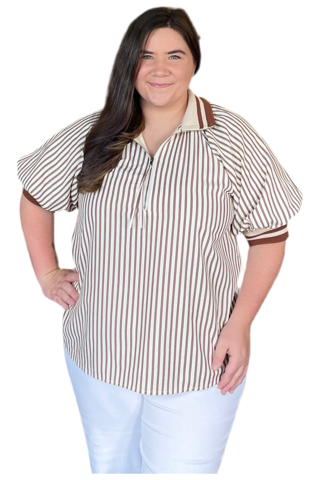 Woman wearing a striped shirt with brown accents on a white background