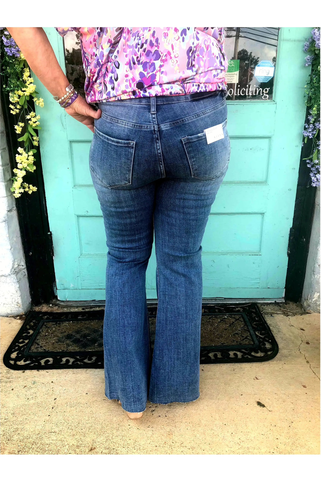 Medium Wash High Rise Twisted Hem Distressed Flare Jeans-Bottoms-Risen-Vintage Dragonfly-Women’s Fashion Boutique Located in Sumrall, Mississippi